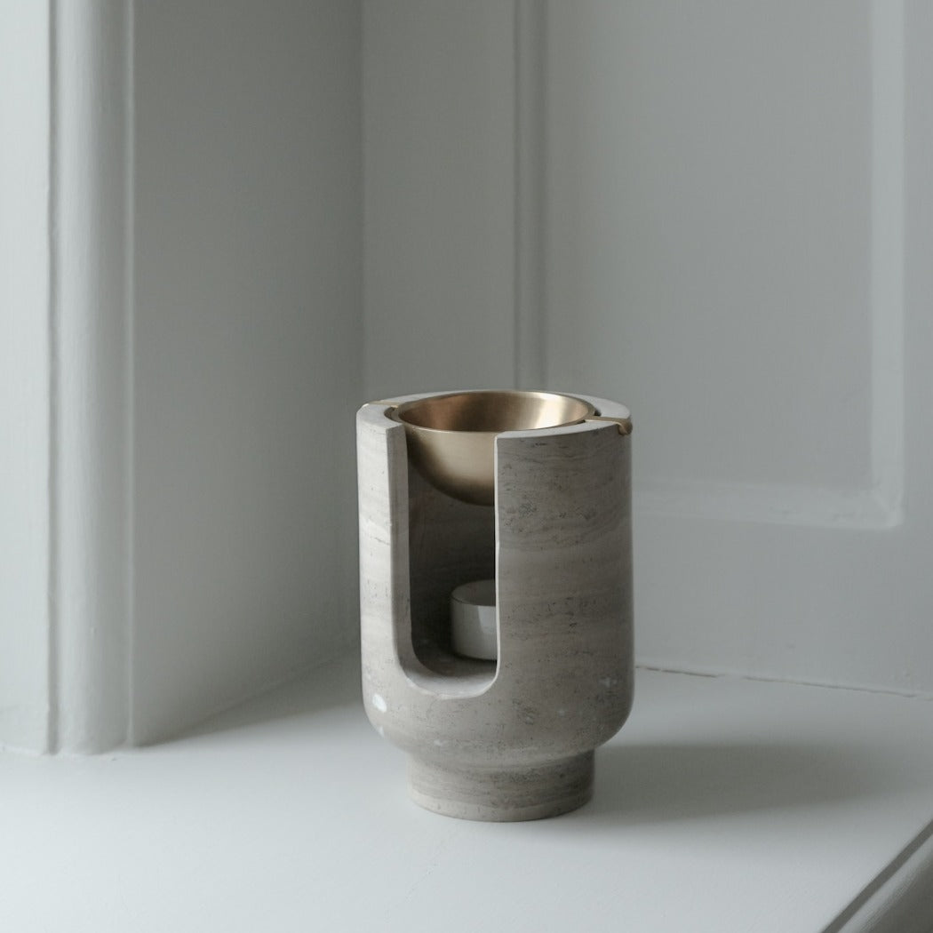 AURA oil burner in chalk grey beige marble and brass bowl by BRANDT Collective