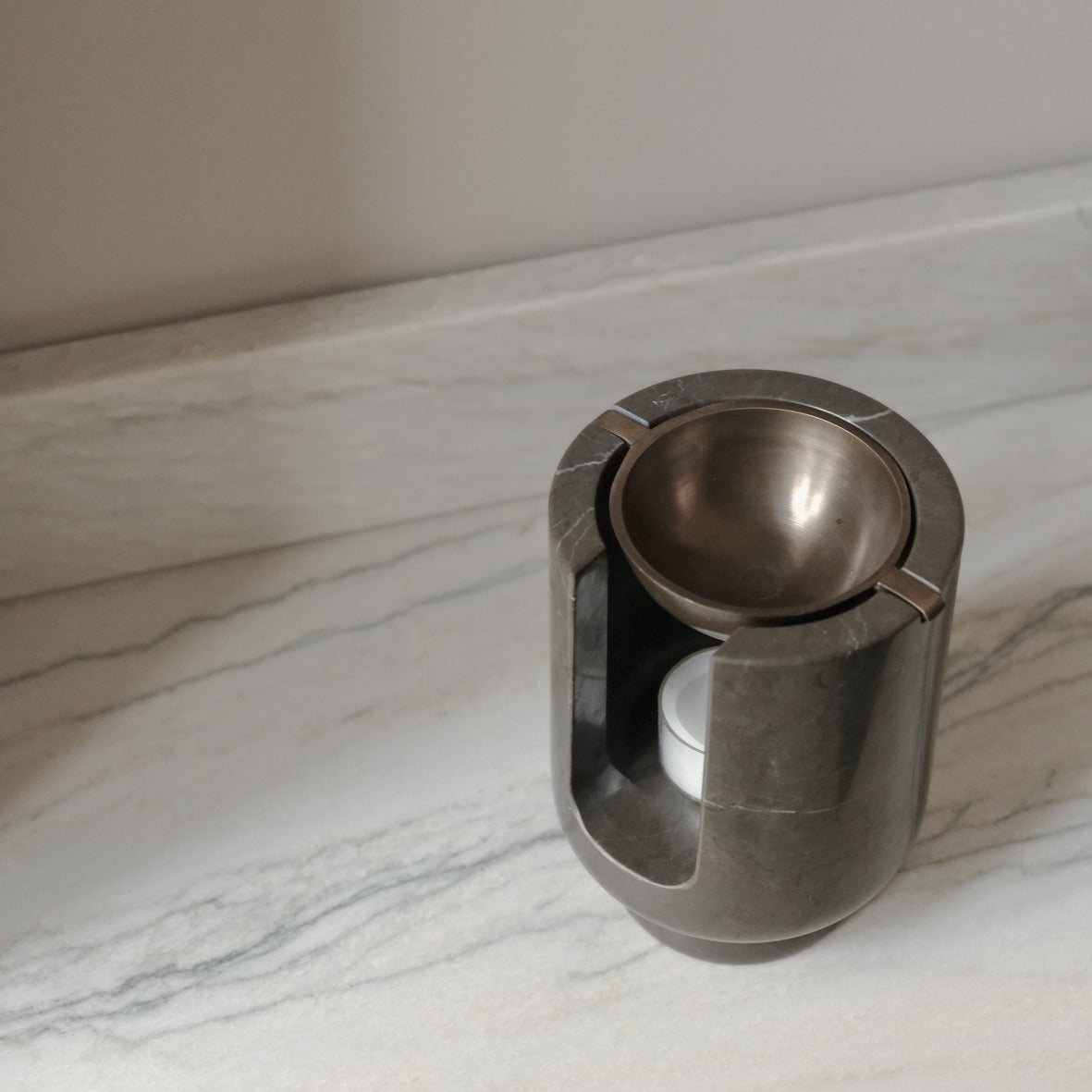 AURA oil burner in Royal grey marble and burnished brass bowl by BRANDT Collective