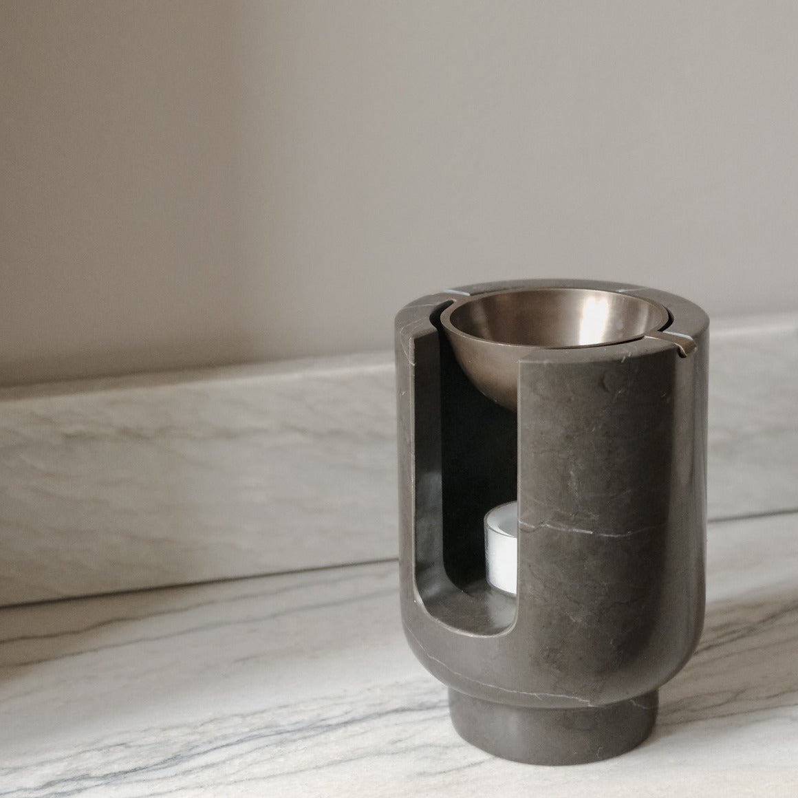 AURA oil burner in Royal grey marble and burnished brass bowl by BRANDT Collective