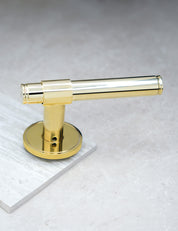 CHISEL door handle in Polished Brass. Classic door hardware made of solid brass by BRANDT Collective.