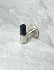  END knob in Brushed Nickel/Black Horn. Luxury cabinet hardware made of solid brass by BRANDT Collective.