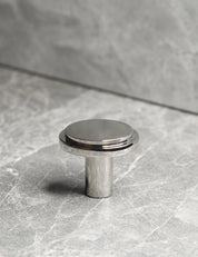 EDGE Knob in Polished Nickel. Elegant cabinet hardware designed by BRANDT Collective.