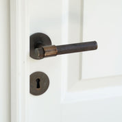 END door handle in Burnished Brass/Wenge. Luxury door hardware made of solid brass by BRANDT Collective.