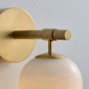 BRANDT Collective FRAGMENT wall lamp in white alabaster and satin brass