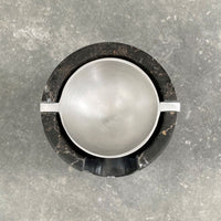 AURA Oil burner from BRANDT Collective in marble Shadow Black and Satin alunimnium bowl