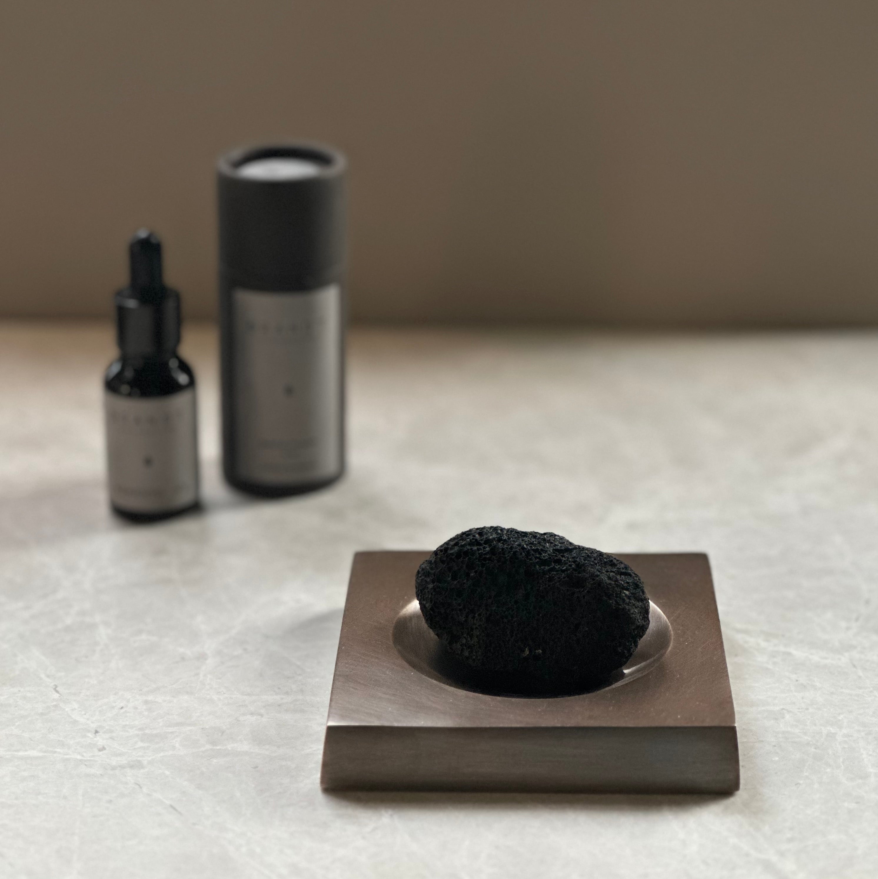 PLATEAU fragrance tray set in Burnished Brass, lava rock and oil. Designed by Julie Brandt for BRANDT Collective