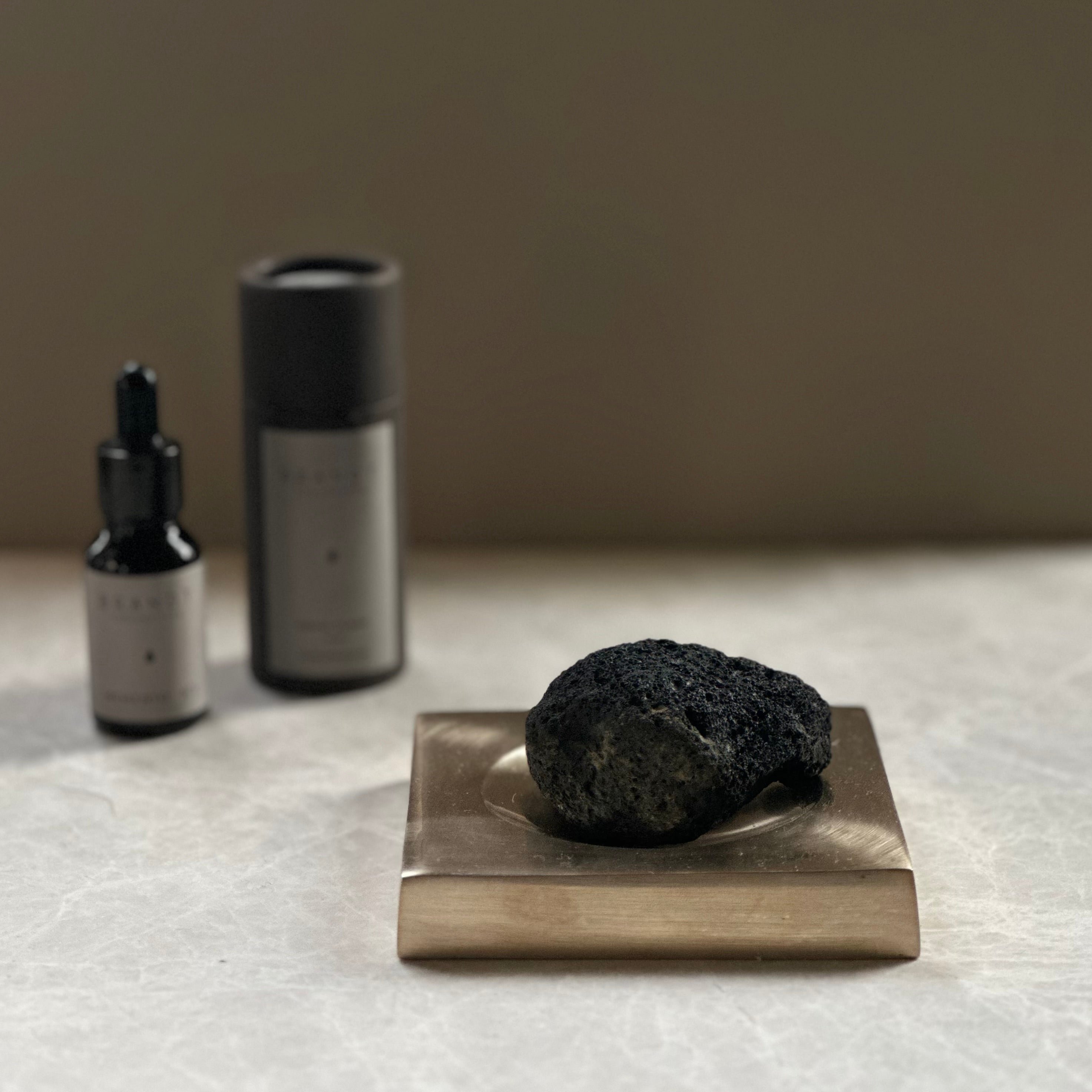 PLATEAU fragrance tray set in Satin Brass, lava rock and oil. Designed by Julie Brandt for BRANDT Collective