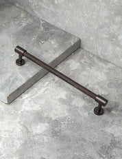 REFINED END pull bar 186 mm in Burnished Brass/Wenge. Modern cabinet hardware made of solid brass by BRANDT Collective.