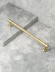 REFINED END pull bar 186 mm in Brushed Brass/Brushed Brass. Modern cabinet hardware made of solid brass by BRANDT Collective.