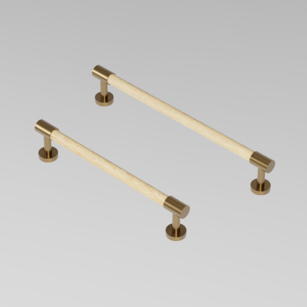 REFINED END pull bar handle 154 mm in Brushed Brass/Oak. Luxury cabinet hardware made of solid brass by BRANDT Collective.