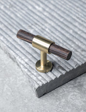  REFINED T-bar 54 mm in Brushed Brass/Wenge. Modern kitchen hardware made of solid brass by BRANDT Collective.