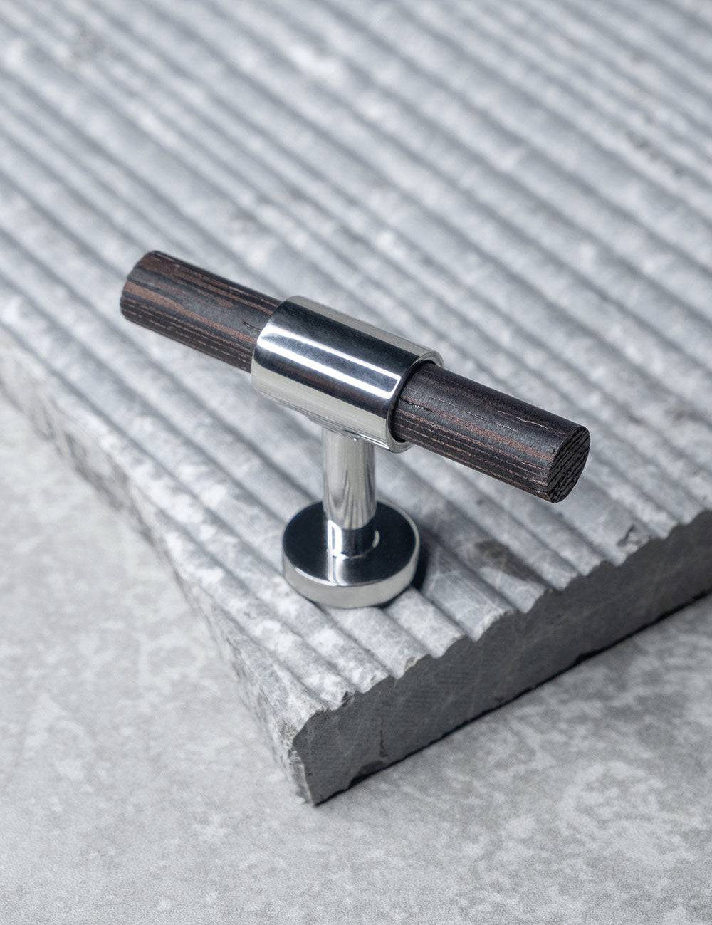 REFINED T-bar 54 mm in Polished Nickel/Wenge. Modern kitchen hardware made of solid brass by BRANDT Collective.