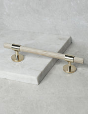 SIGNATURE 30 Pull bar handle 188 mm in Polished Brass/Oak. Luxury cabinet hardware made of solid brass by BRANDT Collective.