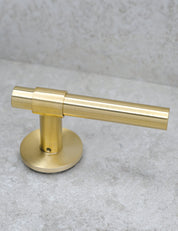  SIGNATURE door handle in Brushed Brass/Brushed Brass. Modern door hardware made of solid brass by BRANDT Collective.