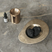 SENSE oil burner in satin brass from BRANDT Collective