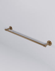 END towel bar 606 mm in Satin Brass. Luxury bathroom hardware made of solid brass by BRANDT Collective. 