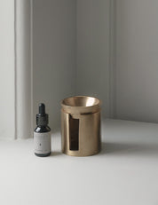 SENSE oil burner in satin brass from BRANDT