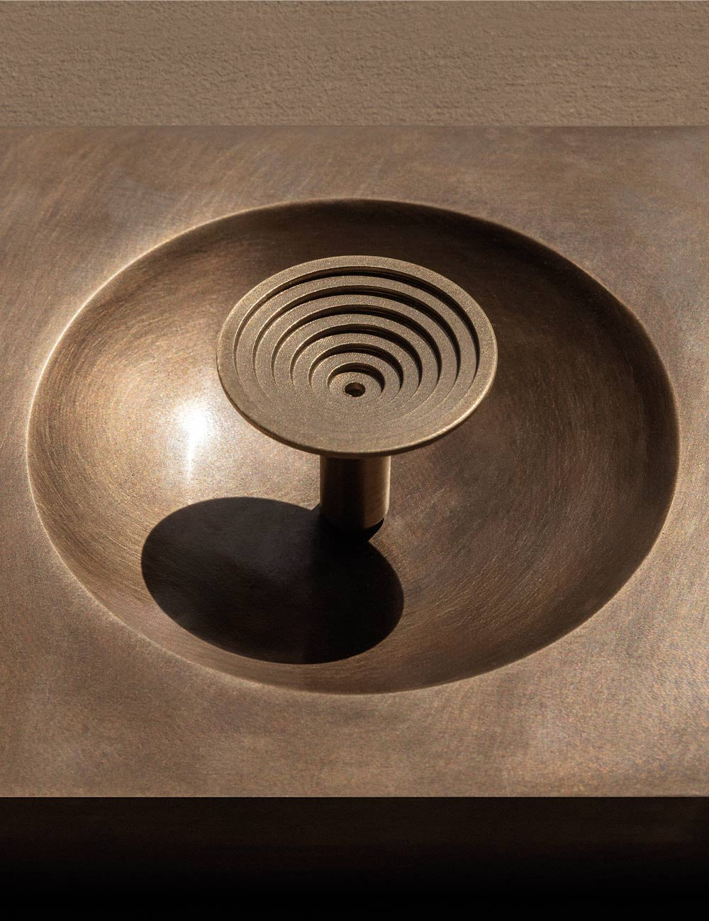 TERRACE knob in burnished brass by BRANDT Collective. A hardware collection in collab with Norm architects consisting of knobs, T-bars and pull bars.