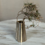 TRUNK vase in satin brass. Designed by Julie Brandt for BRANDT Collective